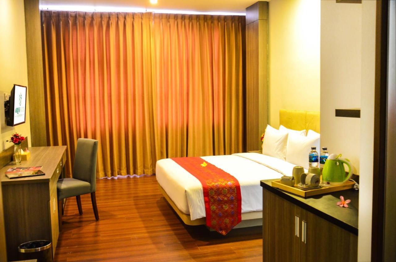 Airish Hotel Palembang Exterior foto