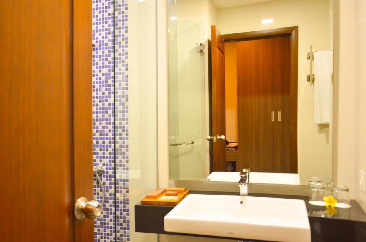 Airish Hotel Palembang Exterior foto