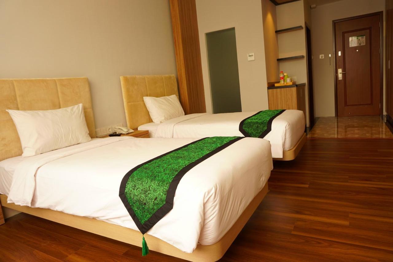 Airish Hotel Palembang Exterior foto